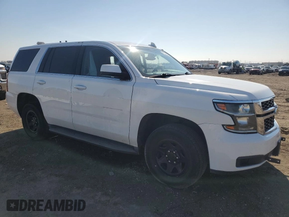 2015 Chevrolet Tahoe Commercial with VIN 1GNLC2EC2FR571987, listed as a Copart auction lot 45346895 with 106,708 mi miles and Salvage title. Bid and sale history available at DreamBid. Image 4.