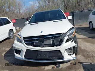 2015 Mercedes-Benz M 63 AMG with VIN 4JGDA7EB6FA471585, listed as a IAAI auction lot 41883006 with 39,243 mi miles and . Bid and sale history available at carsss.com. Image 6.