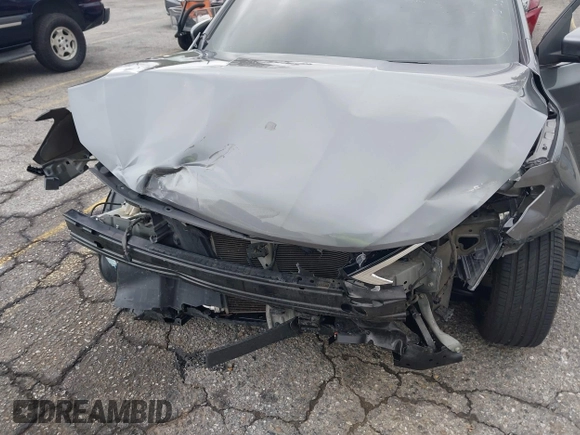 2018 Nissan Sentra SV with VIN 3N1AB7AP1JY225685, listed as a IAAI auction lot 41714478 with 65,019 mi miles and . Bid and sale history available at DreamBid. Image 6.