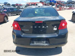 2014 Dodge Avenger SE with VIN 1C3CDZAB1EN133550, listed as a IAAI auction lot 42033001 with 137,592 mi miles. Bid and sale history available at carsss.com. Image 16.