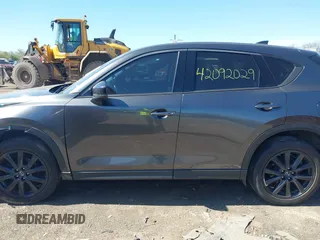2017 Mazda CX-5 Grand Touring with VIN JM3KFBDLXH0225634, listed as a IAAI auction lot 42092029 with 86,373 mi miles and . Bid and sale history available at carsss.com. Image 14.