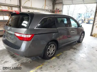 2013 Honda Odyssey EX-L with VIN 5FNRL5H60DB062378, listed as a IAAI auction lot 41862124 with 130,445 mi miles. Bid and sale history available at carsss.com. Image 4.