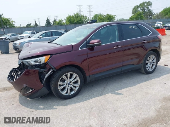 2019 Ford Edge Titanium with VIN 2FMPK4K96KBB20247, listed as a IAAI auction lot 42450212 with 121,756 mi miles and . Bid and sale history available at DreamBid. Image 2.