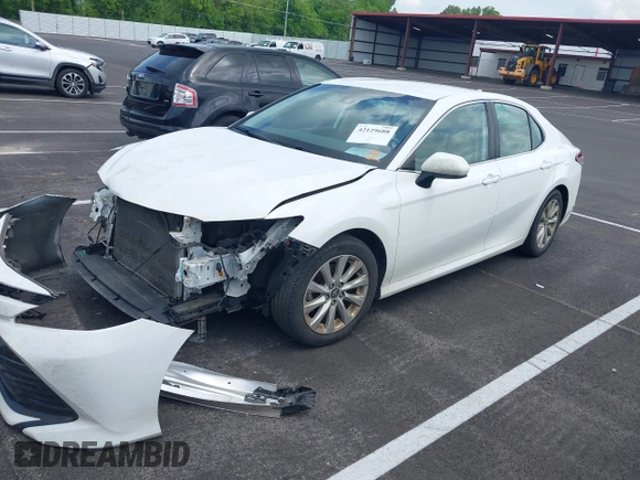 2019 Toyota Camry LE with VIN 4T1B11HK2KU743445, listed as a IAAI auction lot 42129688 with 284,938 mi miles and . Bid and sale history available at DreamBid. Image 17.