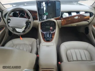 2000 Jaguar XJ with VIN SAJDA14C7YLF11390, listed as a Copart auction lot 73054184 with 0 mi miles and Salvage Title. Bid and sale history available at carsss.com. Image 8.