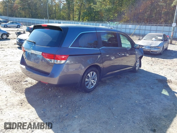 2016 Honda Odyssey EX-L with VIN 5FNRL5H69GB047902, listed as a IAAI auction lot 40795564 with 124,788 mi miles. Bid and sale history available at carsss.com. Image 4.