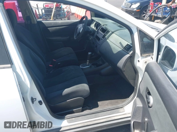 2011 Nissan Versa 1.8 S with VIN 3N1BC1CP0BL452473, listed as a IAAI auction lot 42171311 with 167,018 mi miles. Bid and sale history available at carsss.com. Image 5.