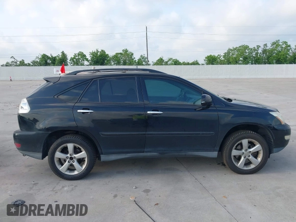 2008 Lexus RX with VIN 2T2HK31U38C064322, listed as a IAAI auction lot 42074366 with 241,459 mi miles. Bid and sale history available at carsss.com. Image 13.
