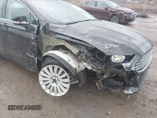 2015 Ford Fusion SE Hybrid with VIN 3FA6P0LU1FR289246, listed as a IAAI auction lot 41733229 with 125,195 mi miles. Bid and sale history available at carsss.com. Image 6.