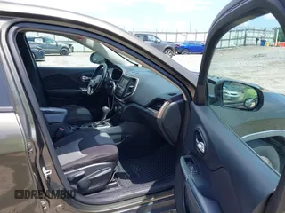 2015 Jeep Cherokee Sport with VIN 1C4PJLAB0FW660722, listed as a IAAI auction lot 42480650 with 272,396 mi miles and . Bid and sale history available at DreamBid. Image 5.