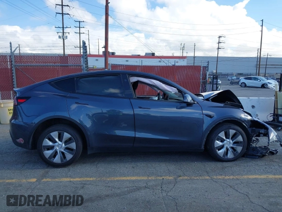 2023 Tesla Model Y Long Range with VIN 7SAYGDEE7PA192488, listed as a IAAI auction lot 42233466 with Not provided miles and . Bid and sale history available at DreamBid. Image 14.