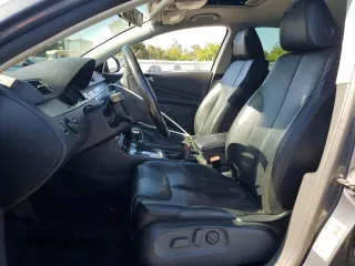 2010 Volkswagen Passat with VIN WVWJM9AN3AE090692, listed as a Copart auction lot 63631585 with 162,379 mi miles and Salvage title. Bid and sale history available at DreamBid. Image 7.