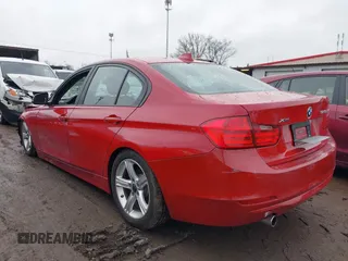 2014 BMW 3 Series 328d xDrive with VIN WBA3D5C51EKX97440, listed as a IAAI auction lot 41576050 with 124,242 mi miles. Bid and sale history available at carsss.com. Image 3.