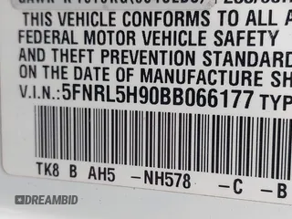 2011 Honda Odyssey Touring with VIN 5FNRL5H90BB066177, listed as a IAAI auction lot 42053368 with 239,205 mi miles and . Bid and sale history available at carsss.com. Image 9.