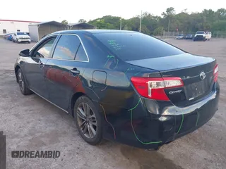 2014 Toyota Camry L with VIN 4T4BF1FK7ER349244, listed as a IAAI auction lot 42040599 with 186,545 mi miles. Bid and sale history available at carsss.com. Image 3.