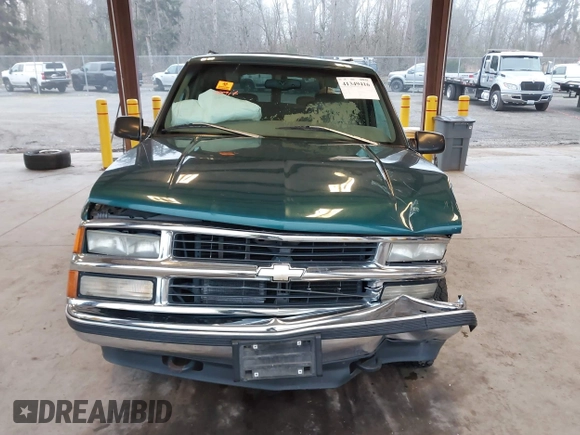 1997 Chevrolet Suburban with VIN 3GNFK16R6VG118242, listed as a IAAI auction lot 41349416 with 183,439 mi miles. Bid and sale history available at carsss.com. Image 12.