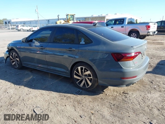 2019 Volkswagen Jetta GLI S z VIN 3VW6T7BU5KM169132, wystawiony jako IAAI lot #41599605 z przebiegiem 59 744 mil mil oraz . Historia ofert i sprzedaży dostępna na DreamBid. Obrazek 3.
