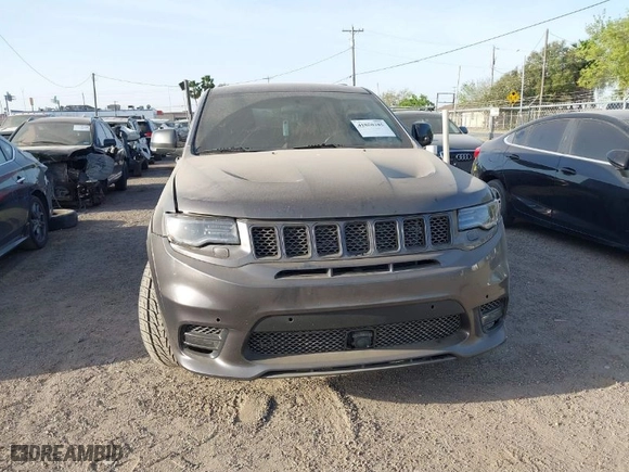 2015 Jeep Grand Cherokee SRT with VIN 1C4RJFDJ9FC842448, listed as a IAAI auction lot 41850385 with 178,439 mi miles. Bid and sale history available at carsss.com. Image 6.