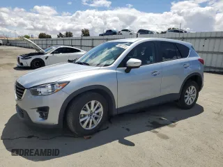 2016 Mazda CX-5 Touring z VIN JM3KE2CY8G0850449, wystawiony jako Copart lot #56601315 z przebiegiem 64 168 mil mil oraz Szkoda całkowita • Salvage title. Historia ofert i sprzedaży dostępna na DreamBid. Obrazek 1.