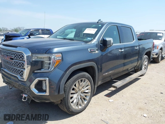 2019 GMC Sierra 1500 Denali z VIN 1GTU9FEL5KZ387012, wystawiony jako IAAI lot #42002743 z przebiegiem 124 718 mil mil oraz . Historia ofert i sprzedaży dostępna na DreamBid. Obrazek 2.