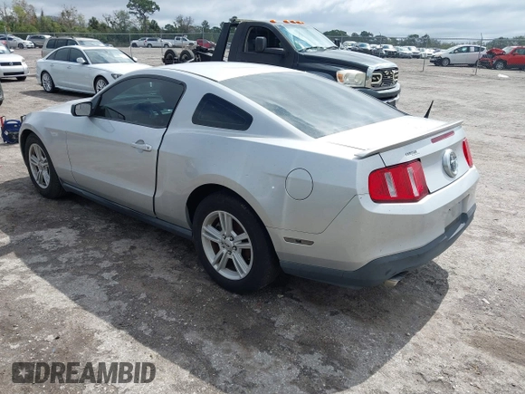 2012 Ford Mustang Premium with VIN 1ZVBP8AMXC5277683, listed as a IAAI auction lot 41674173 with 219,243 mi miles and . Bid and sale history available at carsss.com. Image 3.