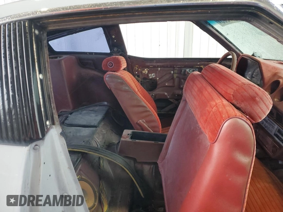 1982 Datsun 280ZX z VIN JN1HZ04S5CX431646, wystawiony jako Copart lot #55607255 z przebiegiem 173 546 mil mil oraz Tytuł czysty. Historia ofert i sprzedaży dostępna na DreamBid. Obrazek 10.