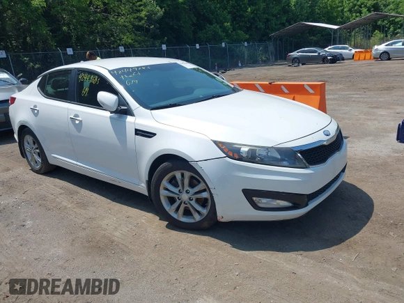 2013 Kia Optima EX z VIN 5XXGN4A70DG091603, wystawiony jako IAAI lot #42449685 z przebiegiem 167 384 mil mil oraz . Historia ofert i sprzedaży dostępna na DreamBid. Obrazek 1.