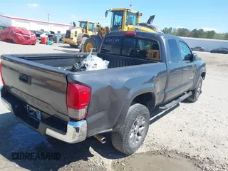 2016 Toyota Tacoma SR with VIN 5TFRX5GN6GX070766, listed as a IAAI auction lot 40461070 with 144,039 mi miles and . Bid and sale history available at DreamBid. Image 4.