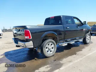 2015 Ram 2500 Laramie with VIN 3C6UR5FL4FG651469, listed as a IAAI auction lot 42179544 with 190,222 mi miles and . Bid and sale history available at DreamBid. Image 4.