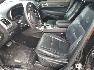 2014 Jeep Grand Cherokee Overland with VIN 1C4RJFCG6EC547604, listed as a Copart auction lot 55824944 with 128,330 mi miles and Clean Title. Bid and sale history available at carsss.com. Image 7.