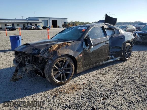 2019 Dodge Charger Scat Pack with VIN 2C3CDXGJ2KH697179, listed as a Copart auction lot 77311144 with 81,789 mi miles and Salvage Title. Bid and sale history available at DreamBid. Image 1.