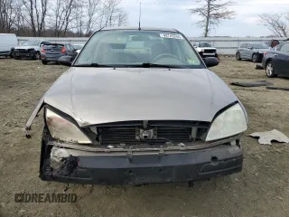 2005 Ford Focus S with VIN 1FAFP34N75W104363, listed as a Copart auction lot 49745295 with 179,704 mi miles and Salvage Title. Bid and sale history available at carsss.com. Image 5.
