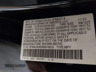 2024 Honda Odyssey EX-L with VIN 5FNRL6H65RB018633, listed as a IAAI auction lot 41801512 with 22,103 mi miles and . Bid and sale history available at DreamBid. Image 9.