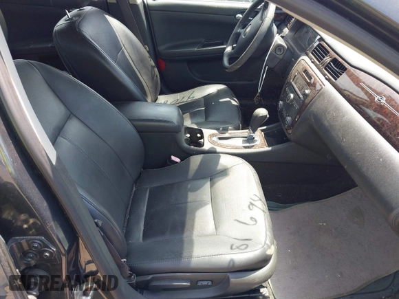 2014 Chevrolet Impala LTZ with VIN 2G1WC5E3XE1161316, listed as a IAAI auction lot 42081694 with 129,353 mi miles and . Bid and sale history available at DreamBid. Image 5.
