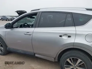 2018 Toyota RAV4 XLE с VIN 2T3WFREV0JW409842, выставлен на аукционе IAAI как лот 42057521 с пробегом 145 915 миль миль и . История ставок и продаж доступна на DreamBid. Изображение 14.