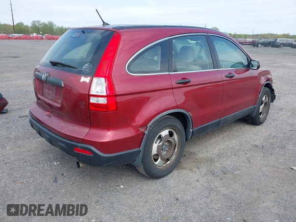 2007 Honda CR-V LX with VIN JHLRE38327C040004, listed as a IAAI auction lot 42084244 with 271,363 mi miles. Bid and sale history available at carsss.com. Image 4.