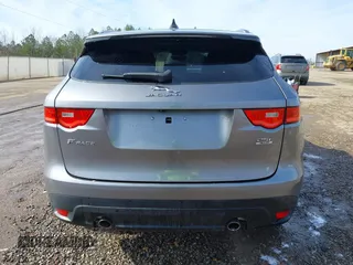 2020 Jaguar F-Pace 25t Premium with VIN SADCJ2FX7LA630157, listed as a IAAI auction lot 41410660 with 58,972 mi miles and . Bid and sale history available at DreamBid. Image 17.