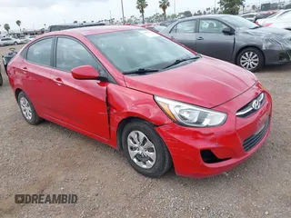 2015 Hyundai Accent GLS with VIN KMHCT4AE6FU848256, listed as a IAAI auction lot 42052721 with 63,453 mi miles. Bid and sale history available at carsss.com. Image 1.