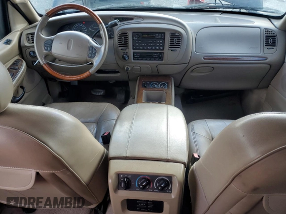 2001 Lincoln Navigator z VIN 5LMFU28R01LJ32925, wystawiony jako Copart lot #83013504 z przebiegiem 132 750 mil mil oraz Szkody całkowita. Historia ofert i sprzedaży dostępna na DreamBid. Obrazek 8.