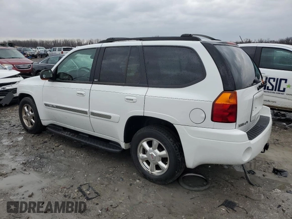 2004 GMC Envoy SLT with VIN 1GKDT13SX42404837, listed as a Copart auction lot 84515994 with 184,153 mi miles and Salvage Title. Bid and sale history available at carsss.com. Image 2.