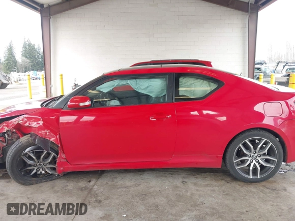 2015 Scion tC z VIN JTKJF5C71FJ008872, wystawiony jako IAAI lot #41664672 z przebiegiem 119 142 mil mil oraz . Historia ofert i sprzedaży dostępna na DreamBid. Obrazek 14.