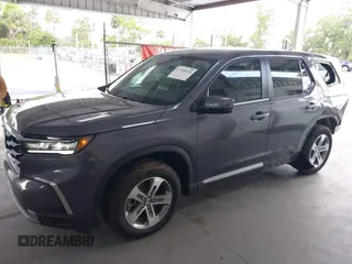2025 Honda Pilot EX-L z VIN 5FNYG2H40SB019525, wystawiony jako IAAI lot #42190029 z przebiegiem 10 794 mil mil oraz . Historia ofert i sprzedaży dostępna na DreamBid. Obrazek 15.