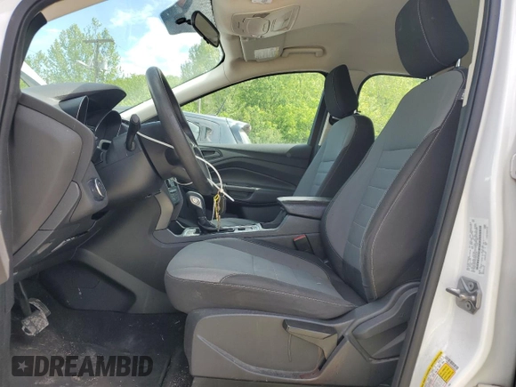 2018 Ford Escape S with VIN 1FMCU0F79JUB26918, listed as a Copart auction lot 56510775 with 184,176 mi miles and Salvage title. Bid and sale history available at DreamBid. Image 7.