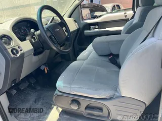 2007 Ford F-150 XLT z VIN 1FTPX12577NA29467, wystawiony jako IAAI lot #42821257 z przebiegiem 232 996 mil mil oraz . Historia ofert i sprzedaży dostępna na DreamBid. Obrazek 4.