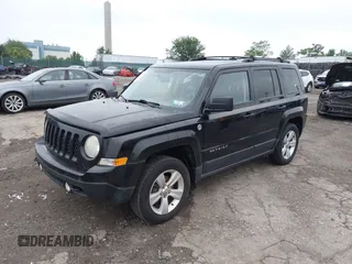 2014 Jeep Patriot Latitude with VIN 1C4NJRFB1ED501740, listed as a IAAI auction lot 42722549 with 147,974 mi miles and . Bid and sale history available at DreamBid. Image 2.