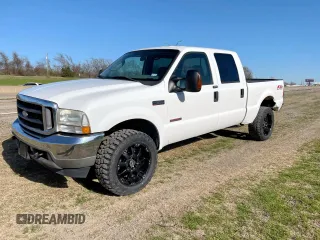 2004 Ford F-350 XL with VIN 1FTSW31P54EB26772, listed as a Copart auction lot 56300325 with 210,944 mi miles and Clean Title. Bid and sale history available at DreamBid. Image 2.