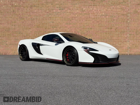 2016 McLaren 650S z VIN SBM11FAAXGW005605, wystawiony jako Copart lot #53181285 z przebiegiem 16 800 mil mil oraz Tytuł czysty. Historia ofert i sprzedaży dostępna na DreamBid. Obrazek 1.
