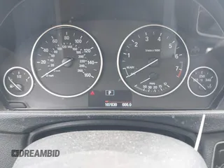 2014 BMW 3 Series 320i xDrive with VIN WBA3C3G5XENS68374, listed as a IAAI auction lot 42042243 with 107,830 mi miles. Bid and sale history available at carsss.com. Image 7.