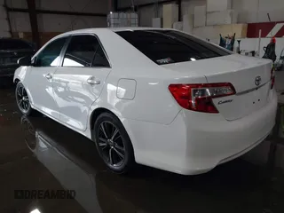 2014 Toyota Camry L with VIN 4T1BF1FKXEU306754, listed as a IAAI auction lot 41613218 with 195,692 mi miles. Bid and sale history available at carsss.com. Image 3.