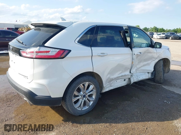 2020 Ford Edge Titanium z VIN 2FMPK3K98LBA42159, wystawiony jako IAAI lot #42358229 z przebiegiem 88 512 mil mil oraz . Historia ofert i sprzedaży dostępna na DreamBid. Obrazek 4.